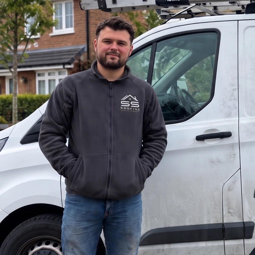 Shaun Smith, owner of SS Roofing Services, with the company van